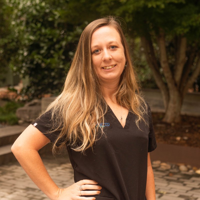 Female dentist working on patient